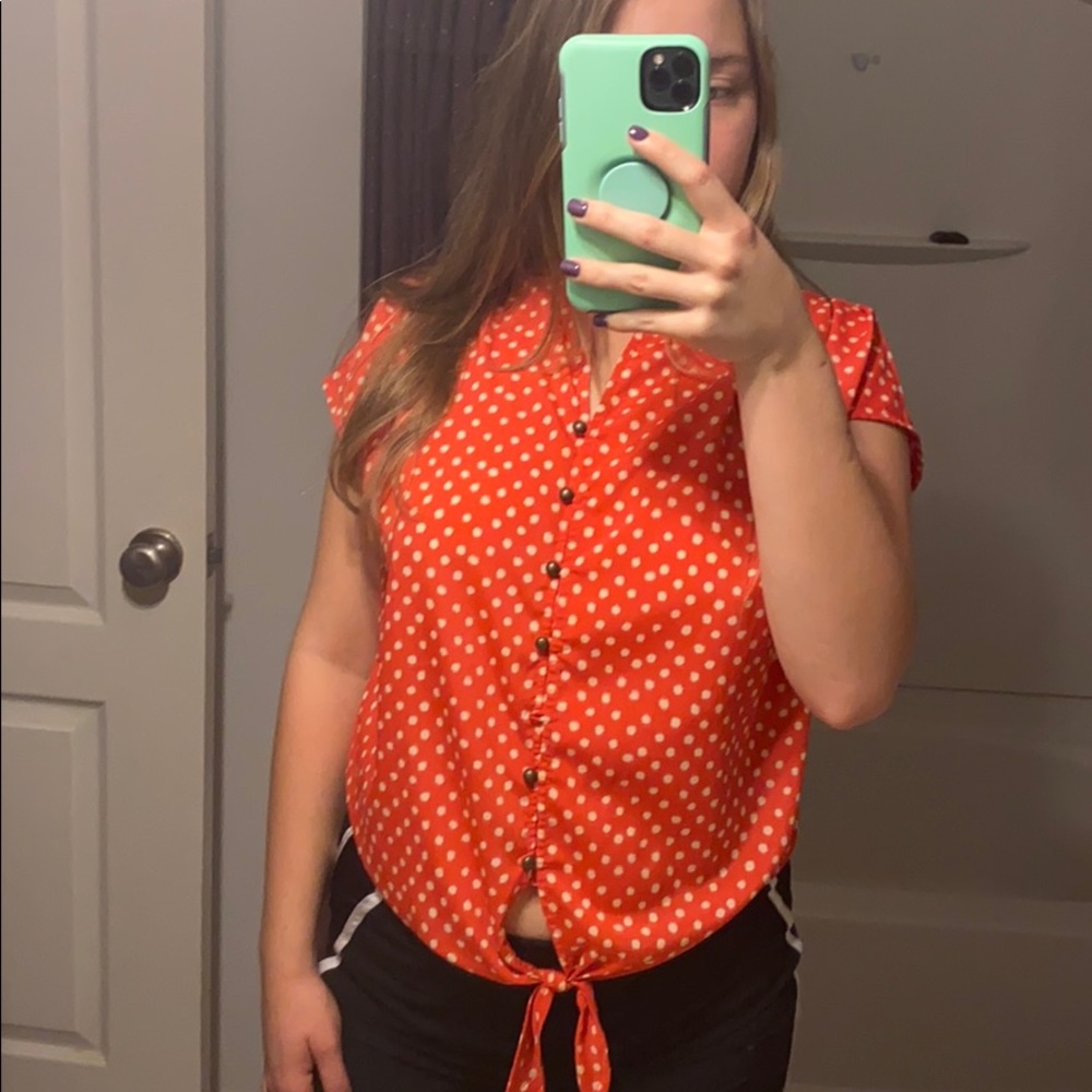 Buttoned up top